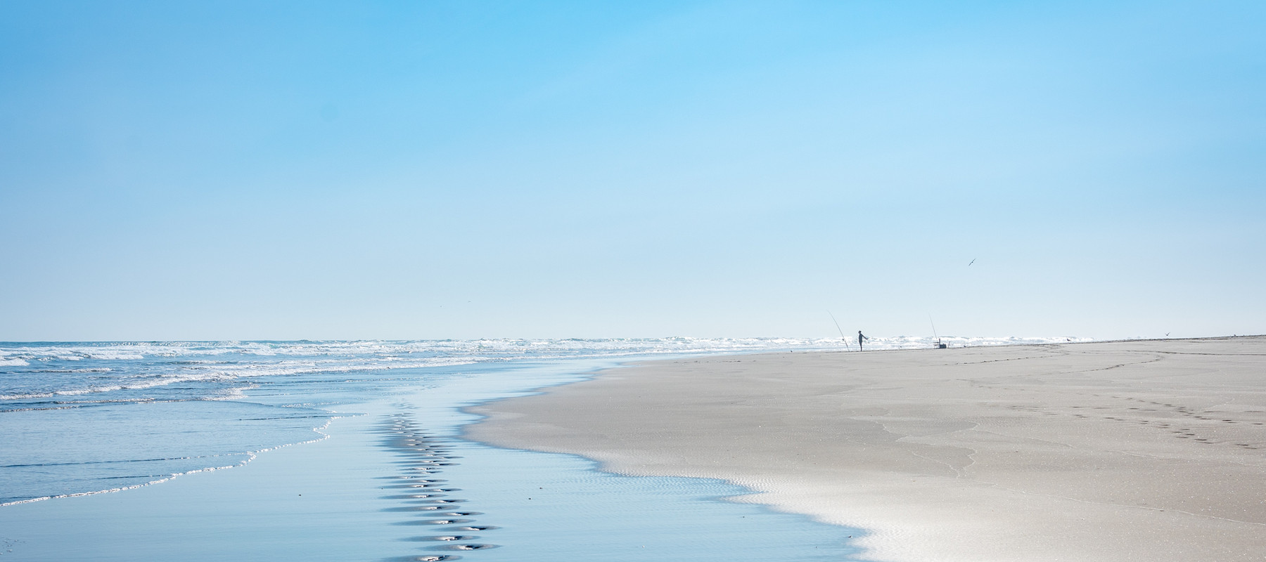 Soft coastal light over open water